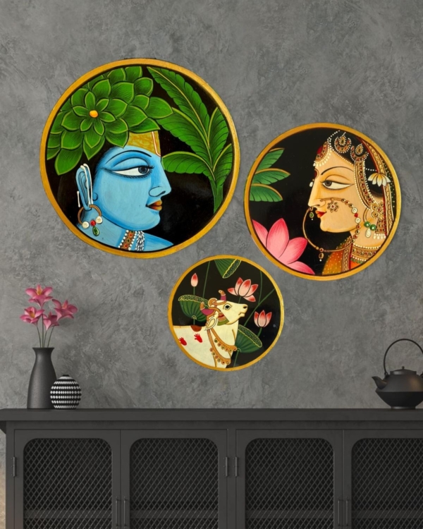 three wall plates one for radha another for krishan and third for cow