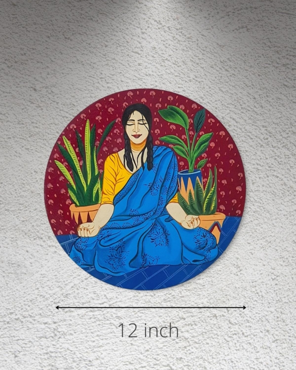 red wall plate with blue yogini with measurement 12 inch